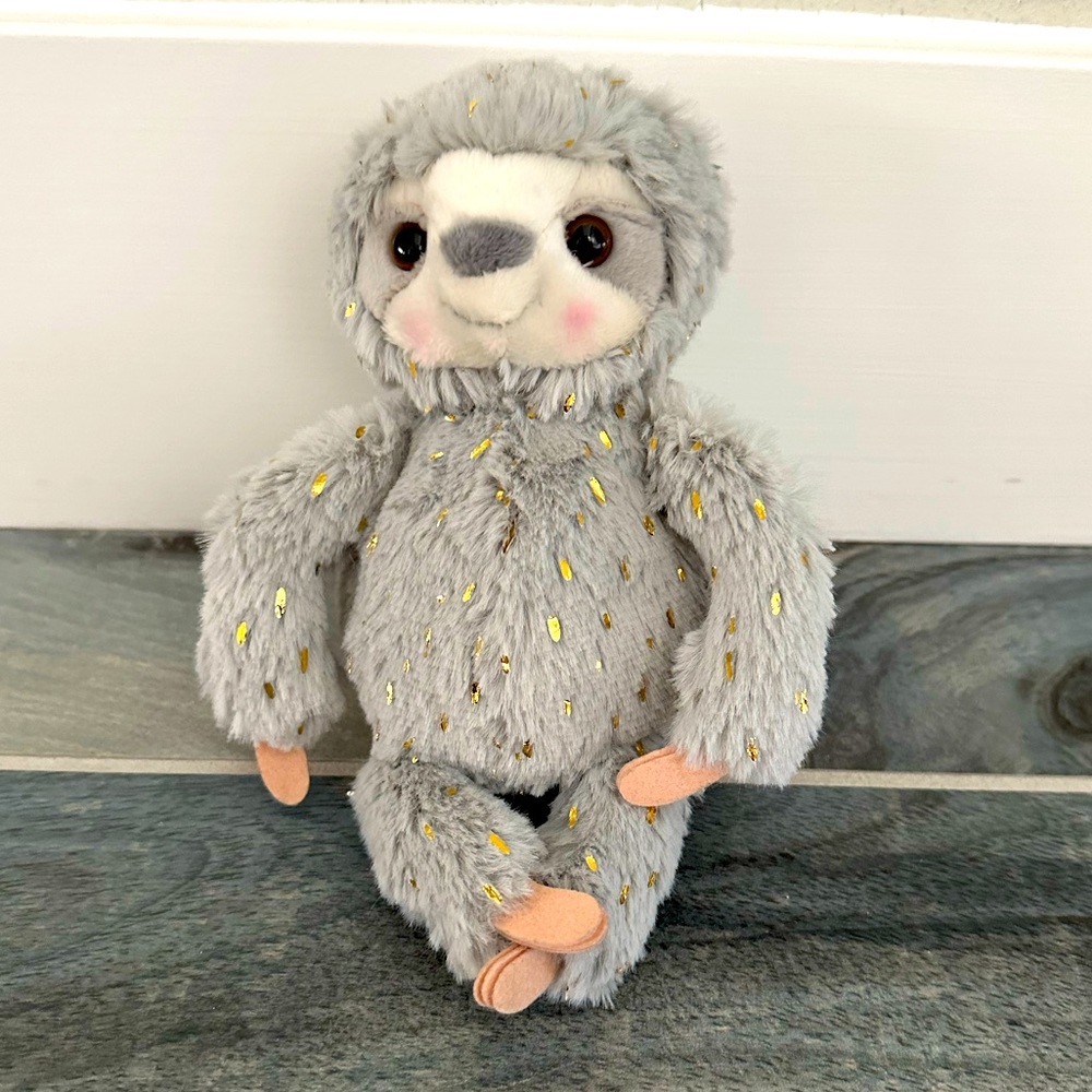 Douglass grey and gold sloth plush